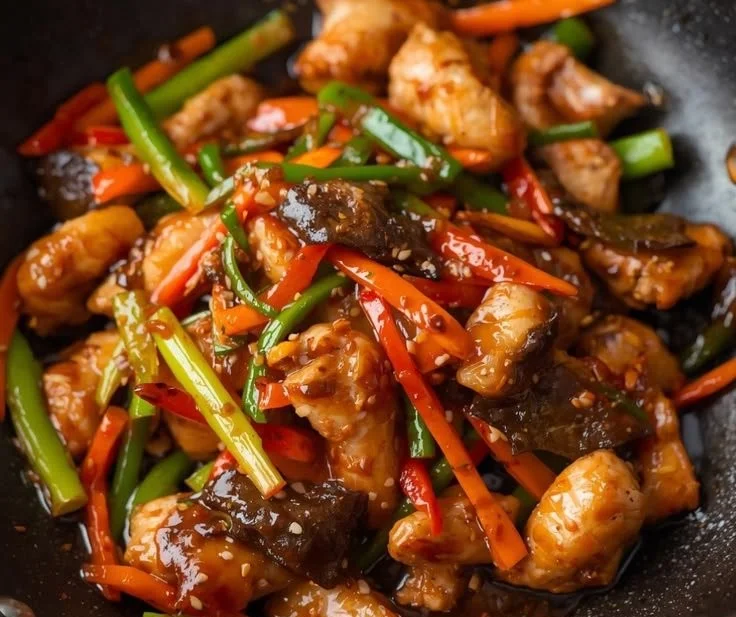 Delicious teriyaki chicken stir fry served in a bowl with vegetables