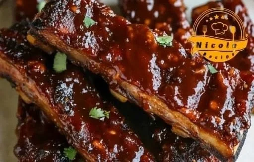 Delicious BBQ tempeh ribs served on a plate, garnished for a stunning presentation.