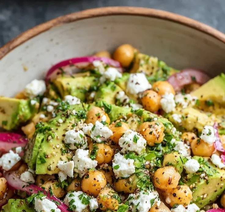 Chickpea Feta Avocado Salad served in a bowl with fresh ingredients