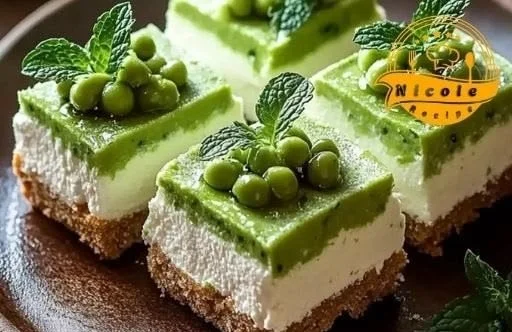 Creamy pea mint terrine with whipped ricotta served on a plate