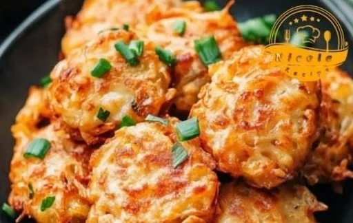 Delicious crispy taro fritters served on a plate with garnishes