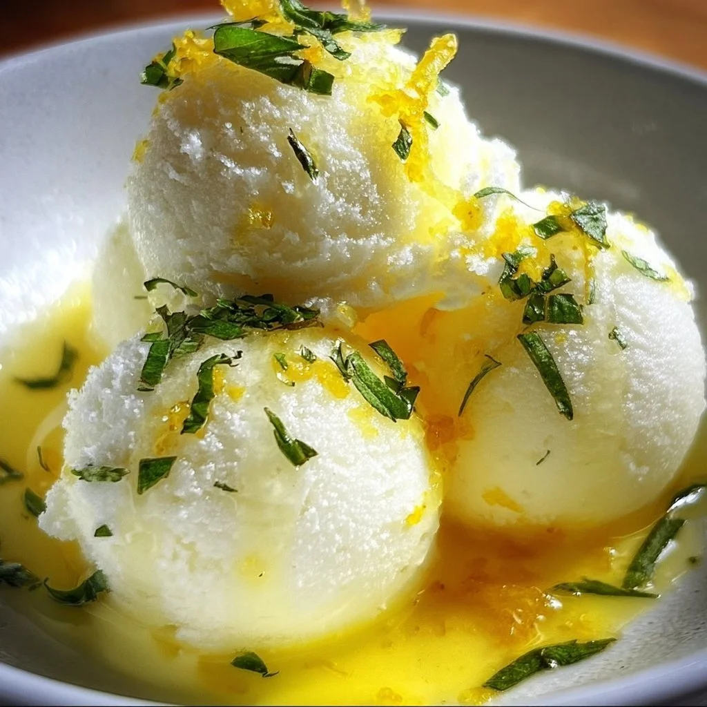 Refreshing Lemon Basil Sorbet served in a glass bowl